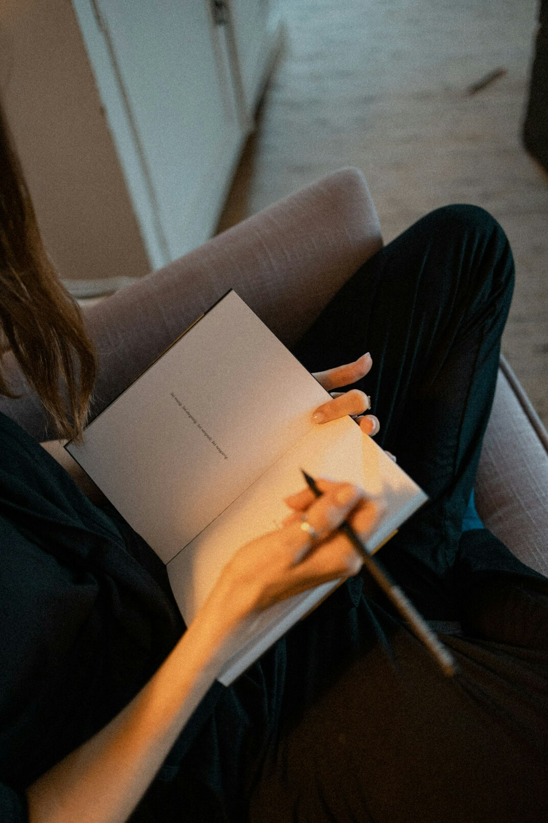 person journaling thoughts